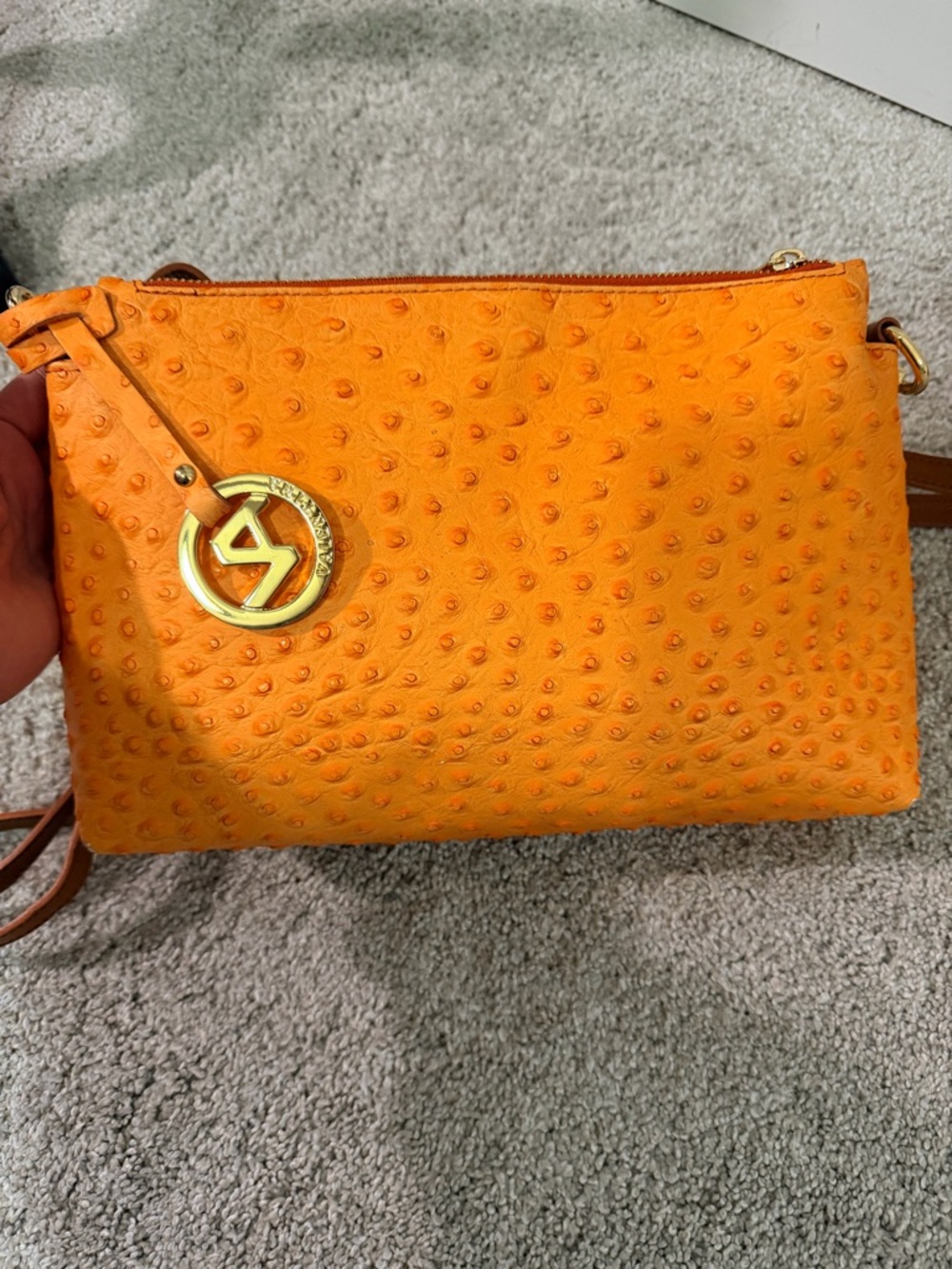 Valentina Orange Ostrich Embossed Leather Crossbody with Gold Logo Charm
